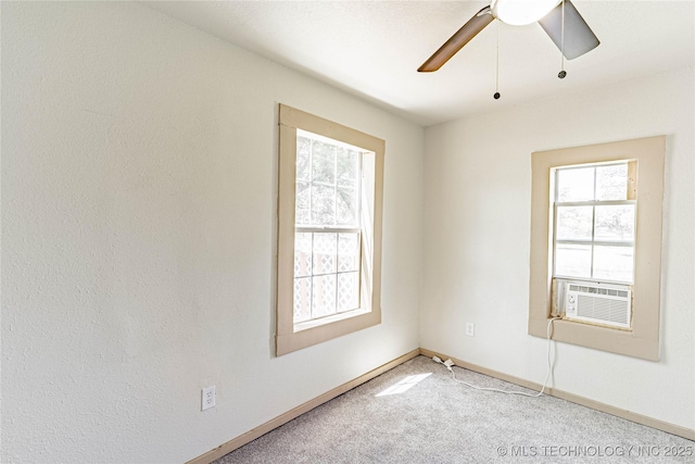 609 E Tejon Ave, Bristow, OK 74010 - carpeted spare room featuring a ceiling fan, cooling unit, and baseboards