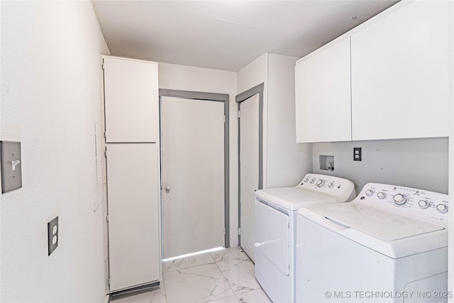 302 E 8th Ave, Bristow, OK 74010 - laundry area featuring light marble finish floors, cabinet space, and washing machine and dryer