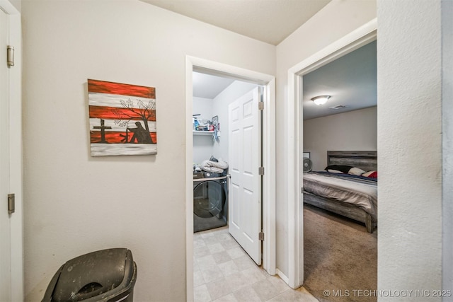 14738 S 274th E Ave, Coweta, OK 74429 - hallway featuring washer / dryer