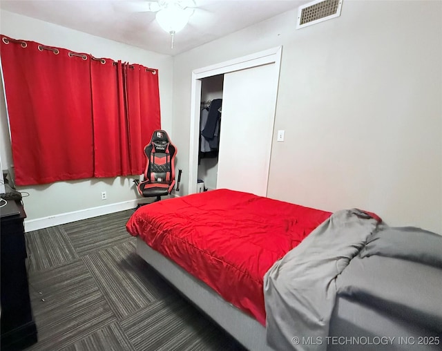 912 Elm, Ardmore, OK 73401 - carpeted bedroom with baseboards and a closet