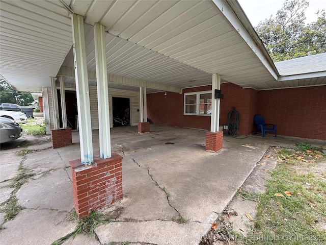 912 Elm, Ardmore, OK 73401 - view of patio featuring an attached carport
