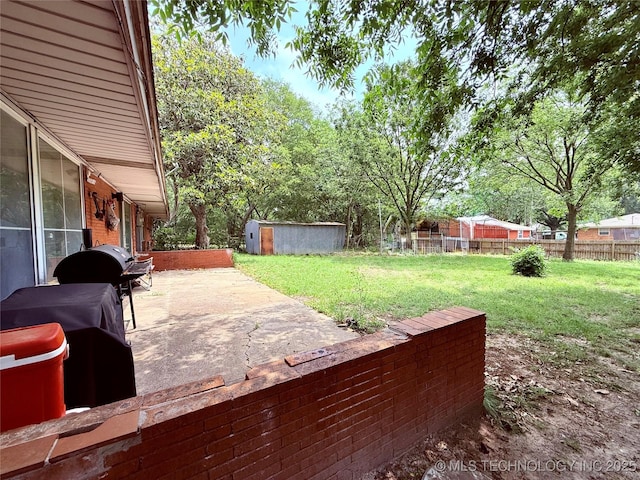912 Elm, Ardmore, OK 73401 - wooden terrace featuring a patio area