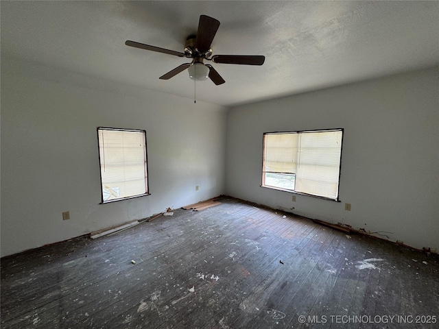 233 W Madison Ave, Mcalester, OK 74501 - spare room with wood-type flooring and ceiling fan