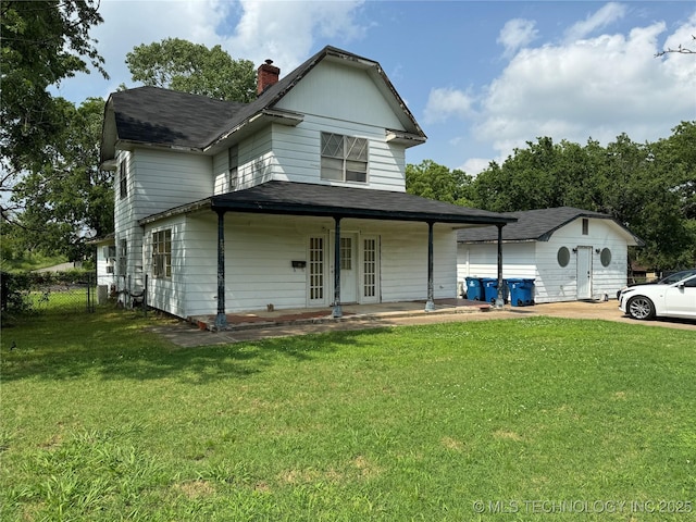233 W Madison Ave, Mcalester, OK 74501 - view of front of property with roof with shingles, a chimney, covered porch, and an outbuilding