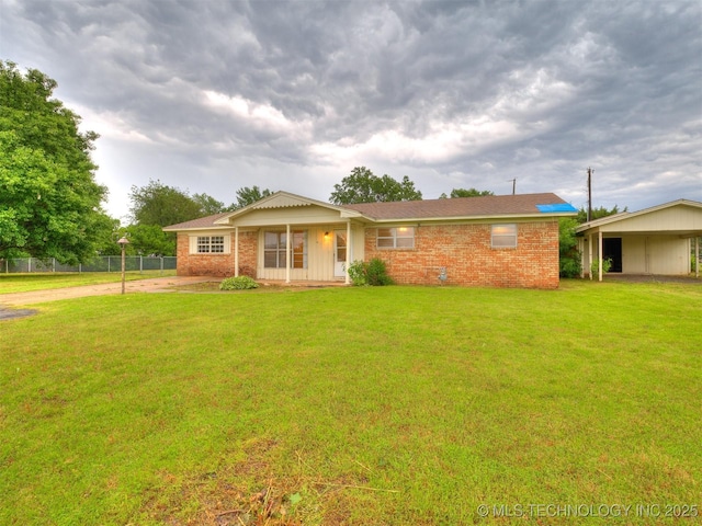 12641 S 281st E Ave, Coweta, OK 74429 - single story home featuring brick siding, driveway, and a carport