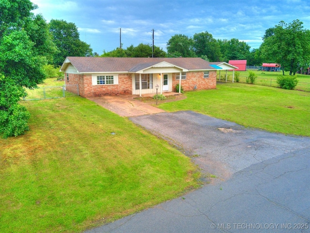 12641 S 281st E Ave, Coweta, OK 74429 - single story home featuring driveway, brick siding, covered porch, and a gate