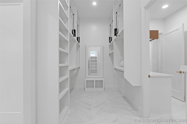 1227 N 71st Pl, Broken Arrow, OK 74014 - walk in closet featuring light marble finish flooring