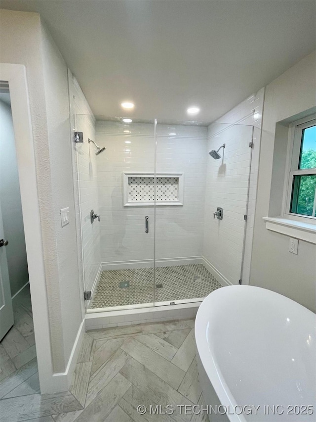 228 W Hickory Dr, Sand Springs, OK 74063 - full bath with a stall shower, marble finish floors, a freestanding tub, and recessed lighting
