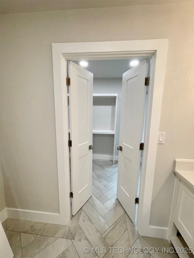 228 W Hickory Dr, Sand Springs, OK 74063 - corridor with baseboards and light marble finish flooring