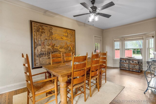 319 E 21st St, Tulsa, OK 74114 - dining area featuring crown molding, wood finished floors, and ceiling fan