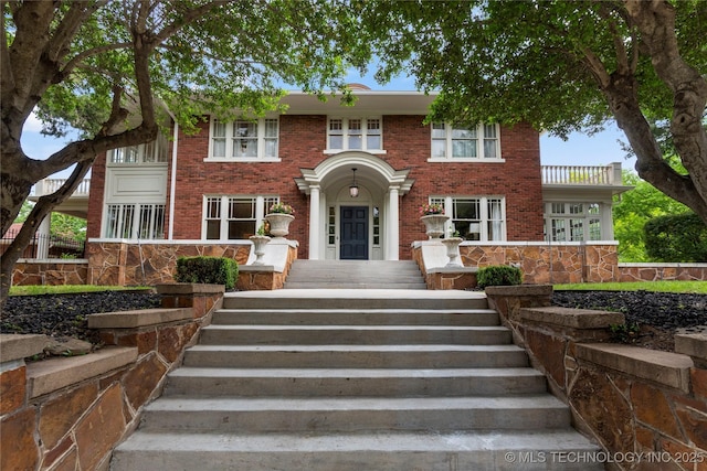 319 E 21st St, Tulsa, OK 74114 - colonial-style house featuring brick siding and stairs