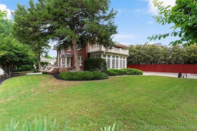 319 E 21st St, Tulsa, OK 74114 - view of yard with a balcony