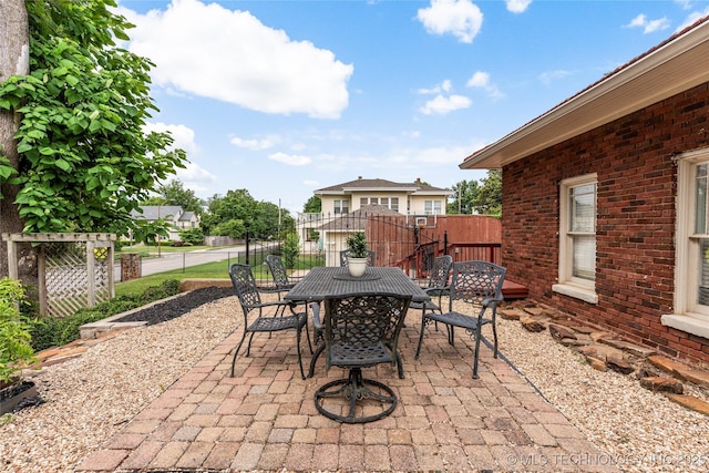 319 E 21st St, Tulsa, OK 74114 - view of patio featuring outdoor dining area