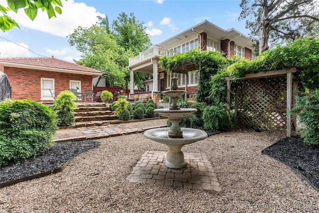 319 E 21st St, Tulsa, OK 74114 - view of yard featuring a balcony