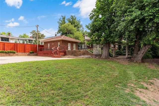 319 E 21st St, Tulsa, OK 74114 - view of yard with a deck