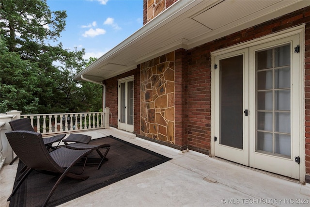 319 E 21st St, Tulsa, OK 74114 - view of patio / terrace with french doors