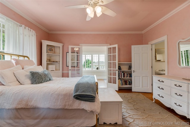 319 E 21st St, Tulsa, OK 74114 - bedroom with light wood finished floors, ornamental molding, and ceiling fan