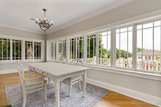 319 E 21st St, Tulsa, OK 74114 - sunroom with a chandelier