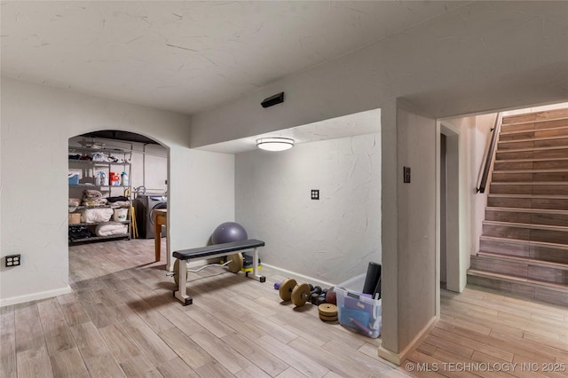 319 E 21st St, Tulsa, OK 74114 - workout room with wood finished floors and baseboards