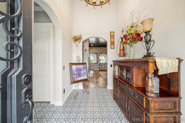 30907 E 68th St S, Broken Arrow, OK 74014 - entrance foyer with arched walkways and baseboards
