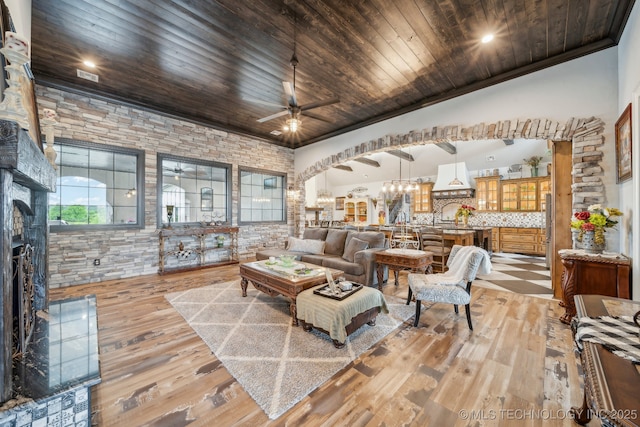 30907 E 68th St S, Broken Arrow, OK 74014 - living area with wooden ceiling, ceiling fan, light wood finished floors, and a stone fireplace