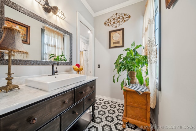 30907 E 68th St S, Broken Arrow, OK 74014 - full bathroom featuring vanity, crown molding, and baseboards