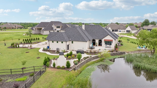 30907 E 68th St S, Broken Arrow, OK 74014 - aerial perspective of suburban area with a nearby body of water