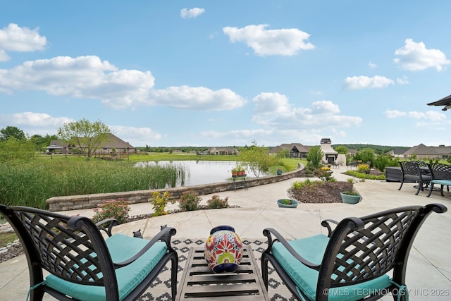 30907 E 68th St S, Broken Arrow, OK 74014 - view of patio featuring a water view