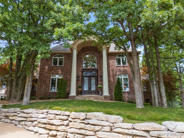 11406 69th E Pl, Bixby, OK 74008 - greek revival inspired property with french doors, brick siding, and a front yard