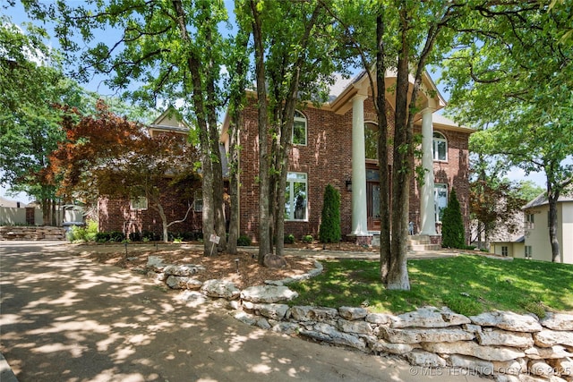 11406 69th E Pl, Bixby, OK 74008 - view of front of home with brick siding and a front lawn