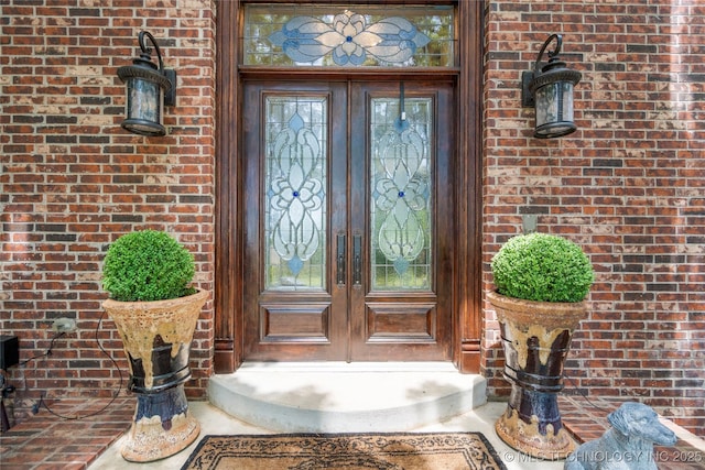 11406 69th E Pl, Bixby, OK 74008 - doorway to property featuring french doors and brick siding