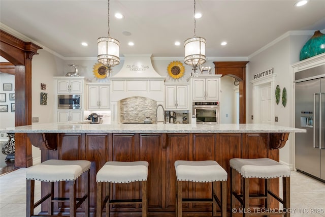 11406 69th E Pl, Bixby, OK 74008 - kitchen featuring built in appliances, recessed lighting, decorative backsplash, a chandelier, and ornamental molding