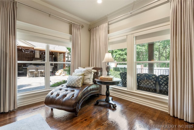 11406 69th E Pl, Bixby, OK 74008 - living area with plenty of natural light, crown molding, and wood finished floors