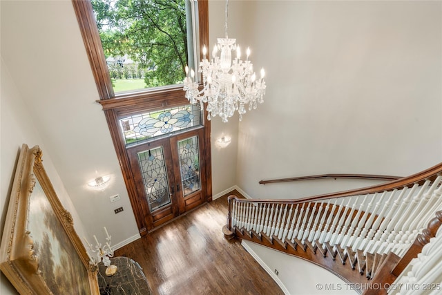 11406 69th E Pl, Bixby, OK 74008 - foyer entrance featuring a chandelier, baseboards, stairway, wood finished floors, and a high ceiling