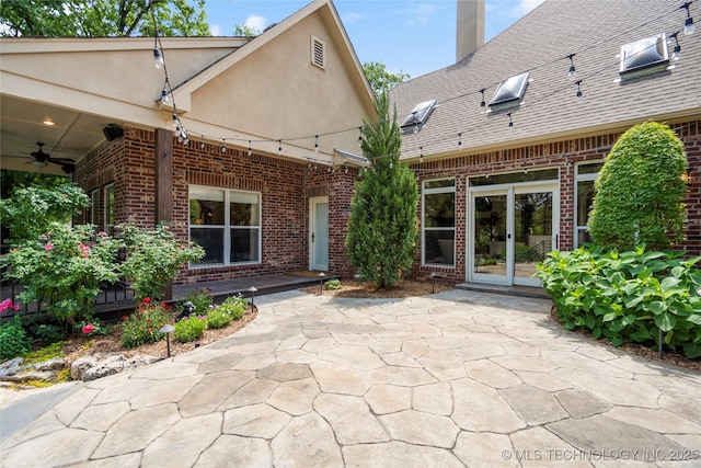 11406 69th E Pl, Bixby, OK 74008 - view of patio / terrace with a ceiling fan and french doors
