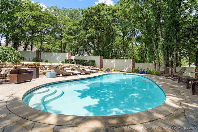 11406 69th E Pl, Bixby, OK 74008 - view of swimming pool with a fenced backyard and a patio area