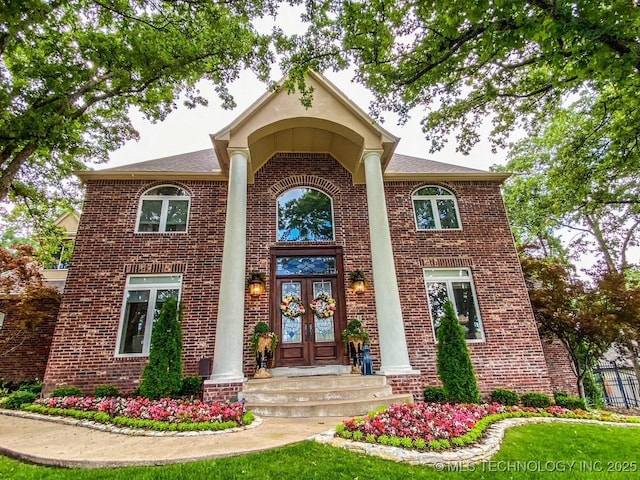 11406 69th E Pl, Bixby, OK 74008 - property entrance with french doors and brick siding