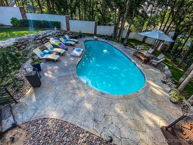11406 69th E Pl, Bixby, OK 74008 - view of swimming pool with a patio area and a fenced backyard