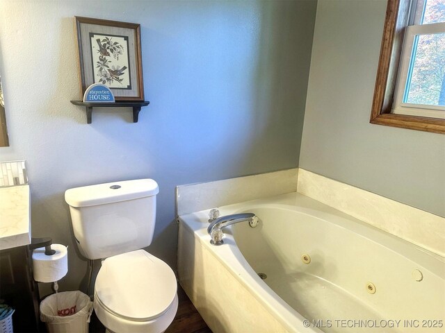 3293 W Southern Ave, Hulbert, OK 74441 - bathroom with a tub with jets, toilet, and vanity