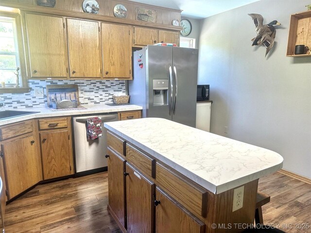 3293 W Southern Ave, Hulbert, OK 74441 - kitchen with appliances with stainless steel finishes, dark wood-type flooring, and light countertops
