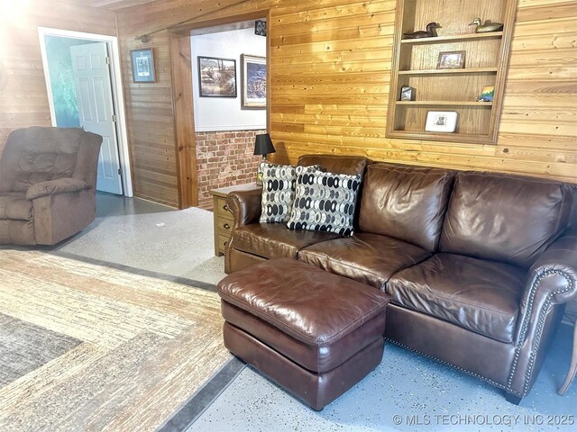 3293 W Southern Ave, Hulbert, OK 74441 - living area featuring speckled floor and wood walls