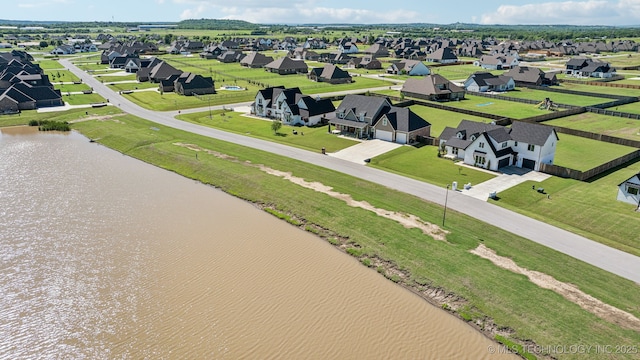 123 E 168th St, Glenpool, OK 74033 - aerial perspective of suburban area featuring a nearby body of water