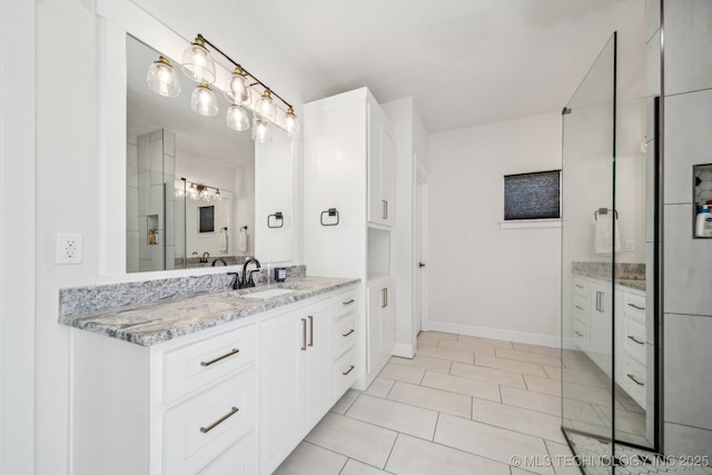 123 E 168th St, Glenpool, OK 74033 - full bathroom featuring vanity, baseboards, and tile patterned flooring