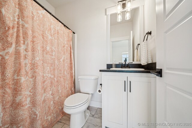 123 S 168th St, Glenpool, OK 74033 - full bathroom with vanity, marble look tiles, and a shower with shower curtain