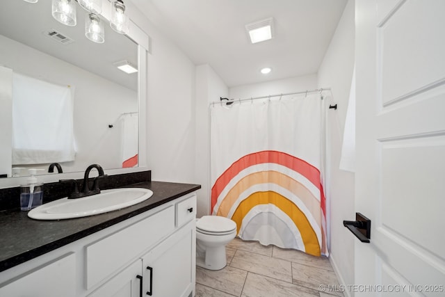 123 E 168th St, Glenpool, OK 74033 - bathroom with marble finish flooring, vanity, toilet, and a shower with curtain