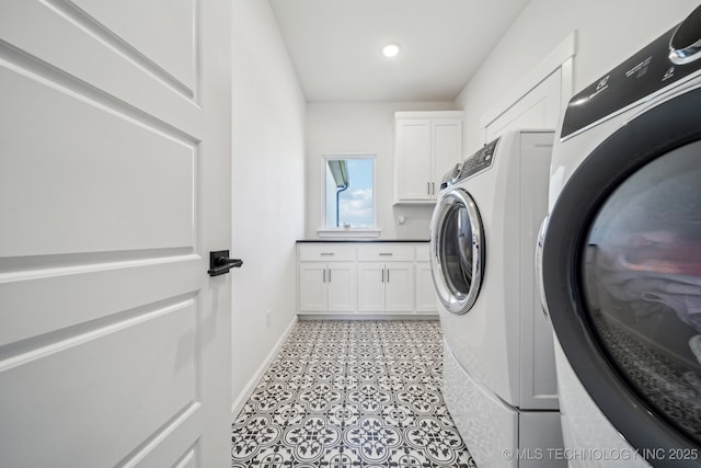 123 E 168th St, Glenpool, OK 74033 - washroom with washer and clothes dryer, cabinet space, recessed lighting, and baseboards