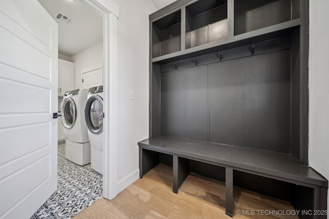 123 E 168th St, Glenpool, OK 74033 - mudroom with separate washer and dryer, baseboards, and light wood finished floors