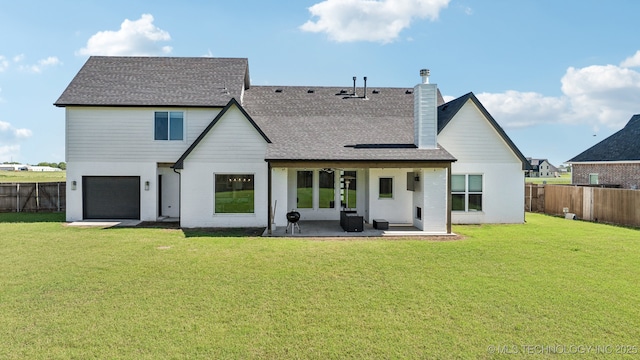 123 E 168th St, Glenpool, OK 74033 - back of property featuring a shingled roof, a chimney, a patio, and a garage