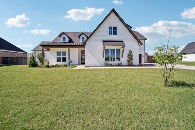 123 E 168th St, Glenpool, OK 74033 - modern farmhouse style home with a standing seam roof, metal roof, and a shingled roof