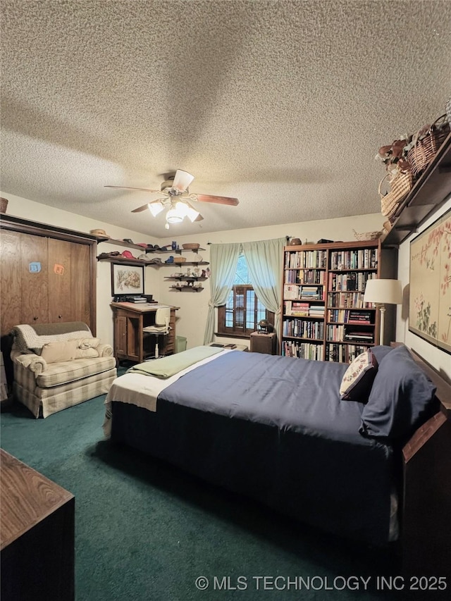 7122 S Shelby Ln, Broken Arrow, OK 74014 - bedroom featuring a textured ceiling, carpet floors, and a ceiling fan